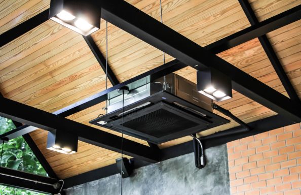 Contemporary Office Installations Exposed industrial look ceiling cassette painted black to match feature visible industrial style roof framework beams